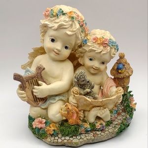 Music box Cherub Twins Plays I'd like to teach the world to sing